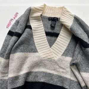White black and gray sweater